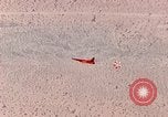 Image of Firebee drone suspended from CH-3 Sea King helicopter California United States USA, 1971, second 39 stock footage video 65675067709