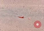 Image of Firebee drone suspended from CH-3 Sea King helicopter California United States USA, 1971, second 40 stock footage video 65675067709