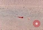Image of Firebee drone suspended from CH-3 Sea King helicopter California United States USA, 1971, second 41 stock footage video 65675067709