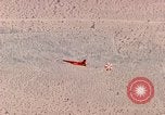 Image of Firebee drone suspended from CH-3 Sea King helicopter California United States USA, 1971, second 43 stock footage video 65675067709