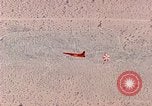 Image of Firebee drone suspended from CH-3 Sea King helicopter California United States USA, 1971, second 46 stock footage video 65675067709