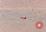 Image of Firebee drone suspended from CH-3 Sea King helicopter California United States USA, 1971, second 48 stock footage video 65675067709
