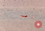 Image of Firebee drone suspended from CH-3 Sea King helicopter California United States USA, 1971, second 49 stock footage video 65675067709