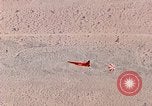 Image of Firebee drone suspended from CH-3 Sea King helicopter California United States USA, 1971, second 50 stock footage video 65675067709