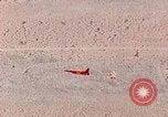 Image of Firebee drone suspended from CH-3 Sea King helicopter California United States USA, 1971, second 54 stock footage video 65675067709