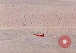 Image of Firebee drone suspended from CH-3 Sea King helicopter California United States USA, 1971, second 59 stock footage video 65675067709