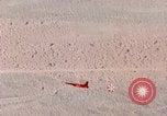 Image of Firebee drone suspended from CH-3 Sea King helicopter California United States USA, 1971, second 60 stock footage video 65675067709