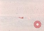 Image of Firebee drone suspended from CH-3 Sea King helicopter California United States USA, 1971, second 62 stock footage video 65675067709