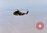 Immagine di CH-3 elicottero recupera BQM-34 F Firebee drone California United States USA, 1971, secondo 61 filmato di repertorio 65675067712