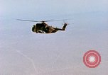 Immagine di CH-3 elicottero recupera BQM-34 F Firebee drone California United States USA, 1971, secondo 62 filmato di repertorio 65675067712