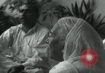 Image of people worship India, 1961, second 6 stock footage video 65675067726