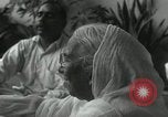 Image of people worship India, 1961, second 7 stock footage video 65675067726