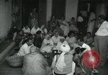 Image of people worship India, 1961, second 8 stock footage video 65675067726