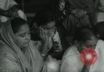 Image of people worship India, 1961, second 13 stock footage video 65675067726
