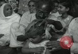 Image of people worship India, 1961, second 14 stock footage video 65675067726