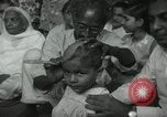 Image of people worship India, 1961, second 15 stock footage video 65675067726
