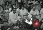 Image of people worship India, 1961, second 18 stock footage video 65675067726