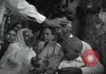 Image of people worship India, 1961, second 22 stock footage video 65675067726