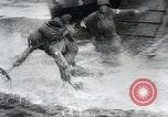 Image of American Marines landing and moving inland Guadalcanal Solomon Islands, 1942, second 39 stock footage video 65675067764