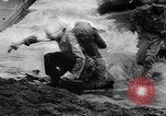 Image of American Marines landing and moving inland Guadalcanal Solomon Islands, 1942, second 41 stock footage video 65675067764