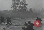 Image of American Marines landing and moving inland Guadalcanal Solomon Islands, 1942, second 47 stock footage video 65675067764