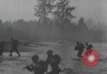 Image of American Marines landing and moving inland Guadalcanal Solomon Islands, 1942, second 48 stock footage video 65675067764