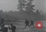 Image of American Marines landing and moving inland Guadalcanal Solomon Islands, 1942, second 49 stock footage video 65675067764