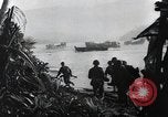 Image of American Marines landing and moving inland Guadalcanal Solomon Islands, 1942, second 52 stock footage video 65675067764