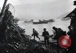 Image of American Marines landing and moving inland Guadalcanal Solomon Islands, 1942, second 53 stock footage video 65675067764