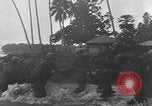 Image of American Marines landing and moving inland Guadalcanal Solomon Islands, 1942, second 58 stock footage video 65675067764