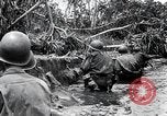 Image of American Marines landing and moving inland Guadalcanal Solomon Islands, 1942, second 59 stock footage video 65675067764