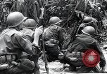 Image of American Marines landing and moving inland Guadalcanal Solomon Islands, 1942, second 62 stock footage video 65675067764