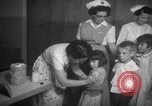 Image of polio vaccination United States USA, 1955, second 21 stock footage video 65675067765