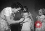 Image of polio vaccination United States USA, 1955, second 30 stock footage video 65675067765