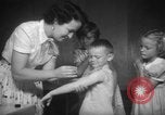 Image of polio vaccination United States USA, 1955, second 33 stock footage video 65675067765