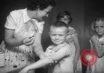 Image of polio vaccination United States USA, 1955, second 34 stock footage video 65675067765