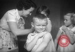 Image of polio vaccination United States USA, 1955, second 36 stock footage video 65675067765