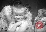Image of polio vaccination United States USA, 1955, second 37 stock footage video 65675067765