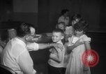 Image of polio vaccination United States USA, 1955, second 41 stock footage video 65675067765