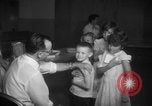 Image of polio vaccination United States USA, 1955, second 42 stock footage video 65675067765