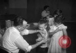 Image of polio vaccination United States USA, 1955, second 47 stock footage video 65675067765