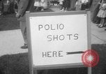 Image of polio vaccination United States USA, 1955, second 44 stock footage video 65675067766