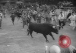 Image of Running of the Bulls Pamplona Spain, 1960, second 18 stock footage video 65675068125