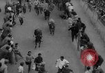 Image of Running of the Bulls Pamplona Spain, 1960, second 23 stock footage video 65675068125
