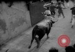 Image of Running of the Bulls Pamplona Spain, 1960, second 34 stock footage video 65675068125