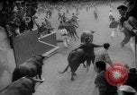 Image of Running of the Bulls Pamplona Spain, 1960, second 35 stock footage video 65675068125