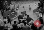 Image of Running of the Bulls Pamplona Spain, 1960, second 36 stock footage video 65675068125