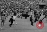 Image of Running of the Bulls Pamplona Spain, 1960, second 45 stock footage video 65675068125