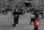 Image of Running of the Bulls Pamplona Spain, 1960, second 46 stock footage video 65675068125