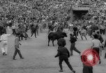 Image of Running of the Bulls Pamplona Spain, 1960, second 47 stock footage video 65675068125